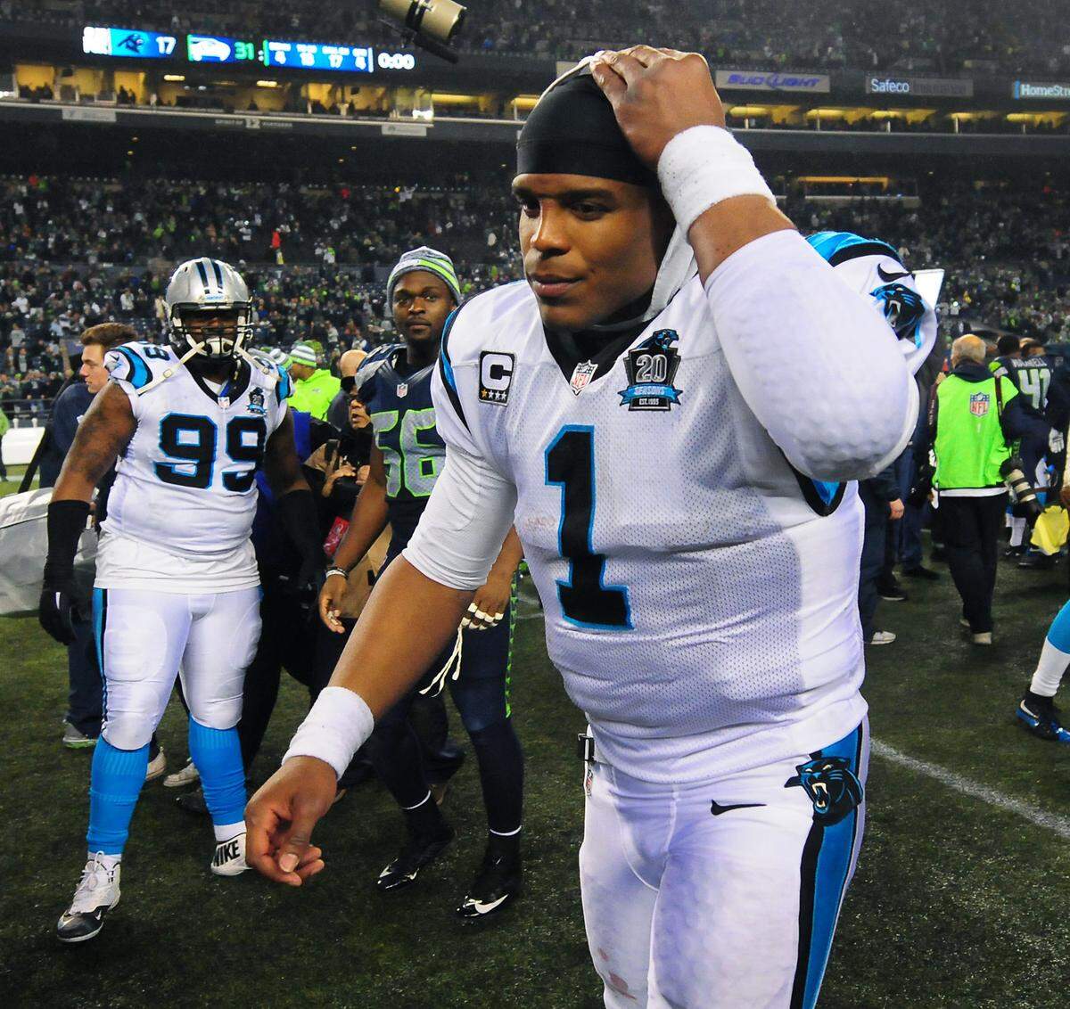 Carolina Panthers quarterback Cam Newton walks off the field after the team’s Jan. 10, 2015 loss to the Seattle Seahawks at CenturyLink Field. 