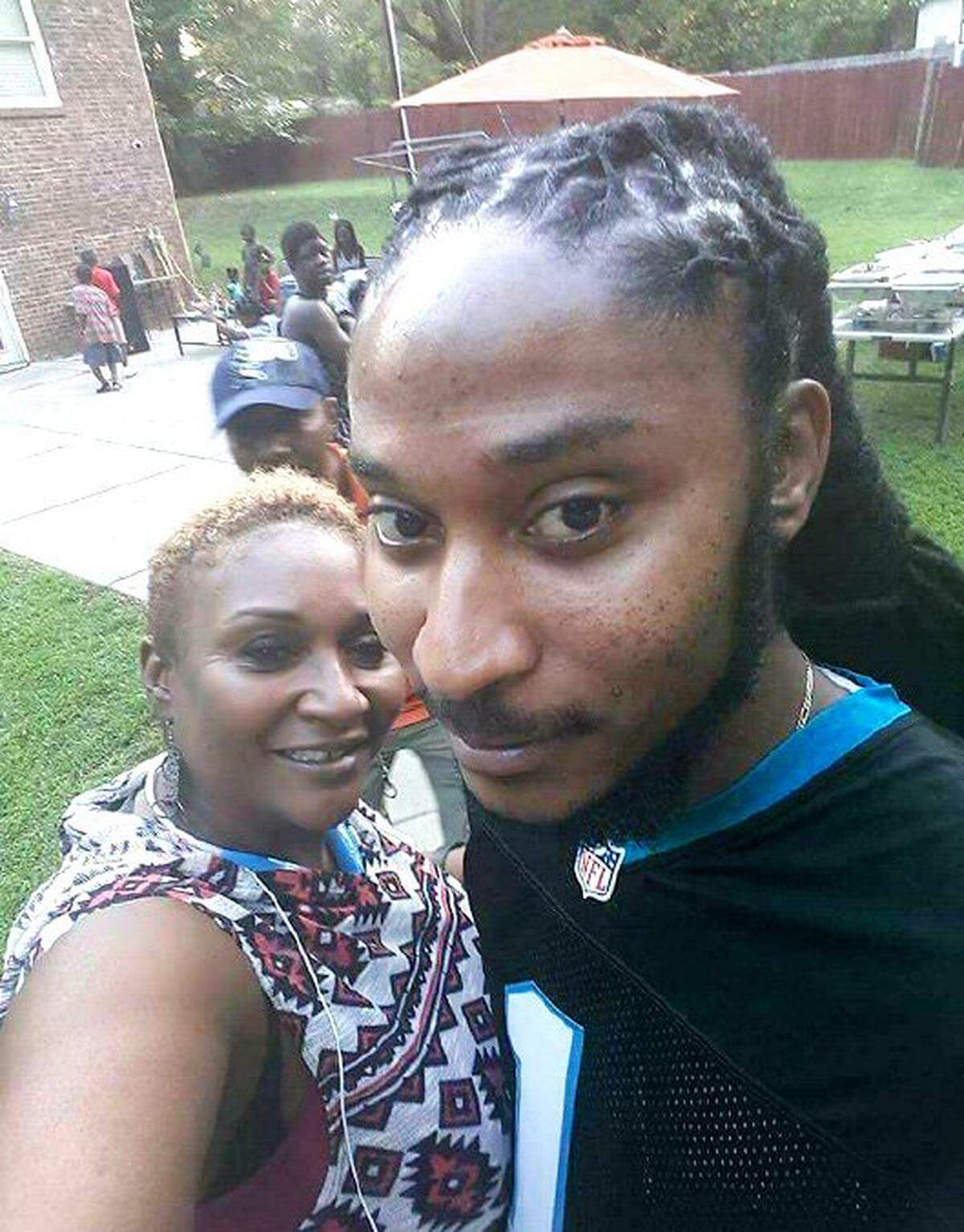 Vivian Carr, left, and her son Justin Carr. Carr was fatally shot during a protest in uptown Charlotte.