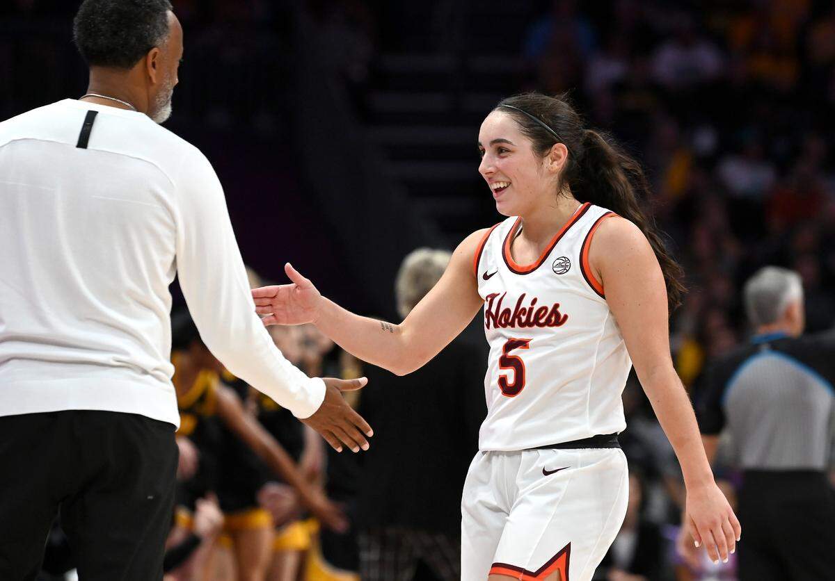 All-America point guard Georgia Amoore and head coach Kenny Brooks moved from Virginia Tech to Kentucky this offseason.