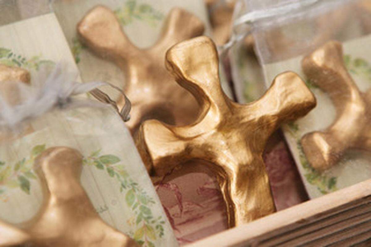 Arden Brewer started out making hand-held clay crosses for friends going through difficult times and now works out of a home studio.