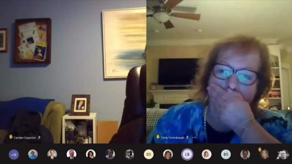 A Cabarrus County school board member is seen in the livestream of a meeting putting her hand over her mouth after hearing fellow member Laura Blackwell use a derogatory slur for people with intellectual or developmental disabilities. Blackwell, who thought her computer was muted, apologized during the meeting. More than 2,000 people have signed a petition calling on her to resign.