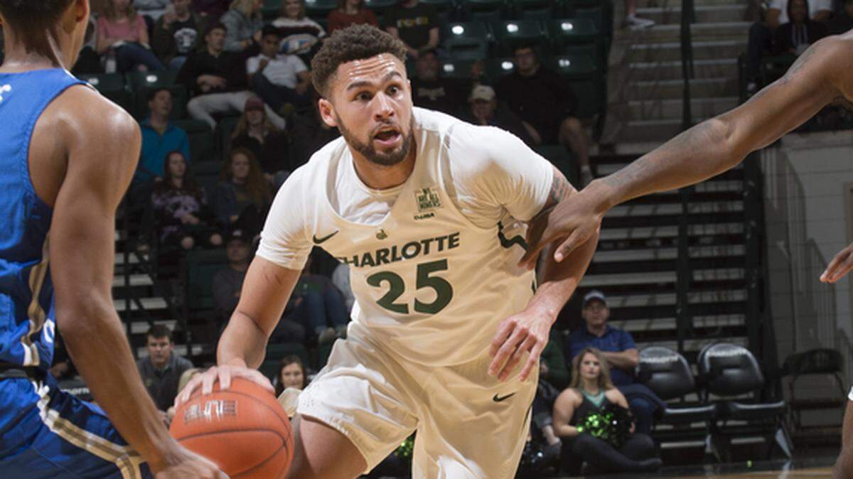 Charlotte’s Drew Edwards drives against Middle Tennessee on Saturday.