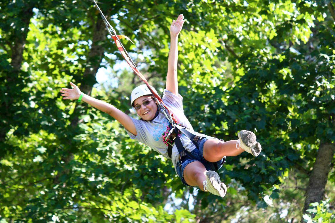 Devon Danka gets in the swing of things at Victory Junction, a camp that serves children with serious medical conditions.