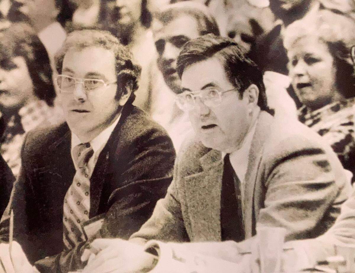 Leonard Laye (left) covers a basketball game along with fellow sportswriter Bill Brill. The date of the photo is unknown. Laye worked at both The Charlotte Observer and The Charlotte News during his career, and the sport he most liked to cover was basketball.