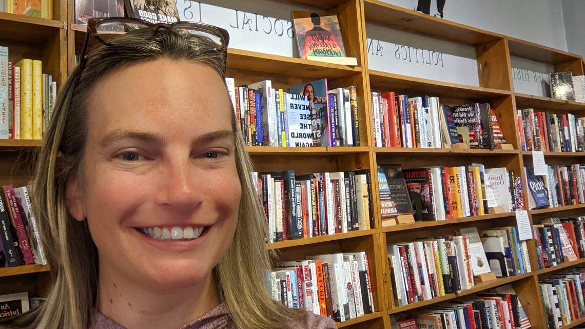 Alissa Redmond stands in front of shelves at her bookstore, South Main Book Company in Salisbury, NC. She has been the target of online trolls and boycotts because she supports equality and Black Lives Matter.