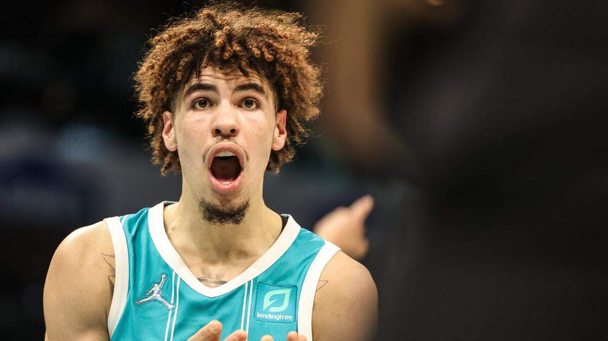 Charlotte Hornets LaMelo Ball, makes a face at a referee at the Spectrum Center in Charlotte, N.C., on Monday, January 10, 2022.