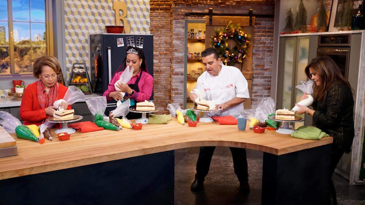 Karen Sullivan (left), Sh-neila Lee, Buddy Valasco and Rachael Ray at work on their cakes.