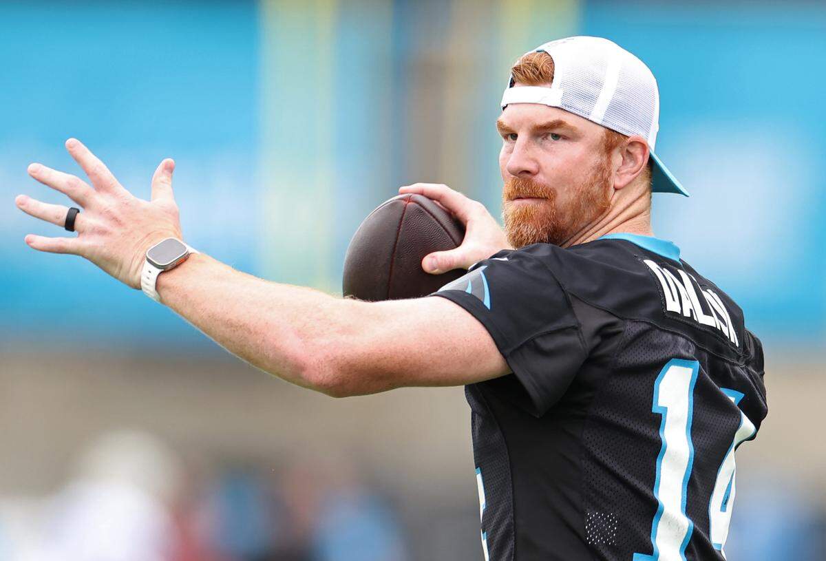 Carolina Panthers quarterback Andy Dalton throws passes during practice on Tuesday, August 6, 2024.