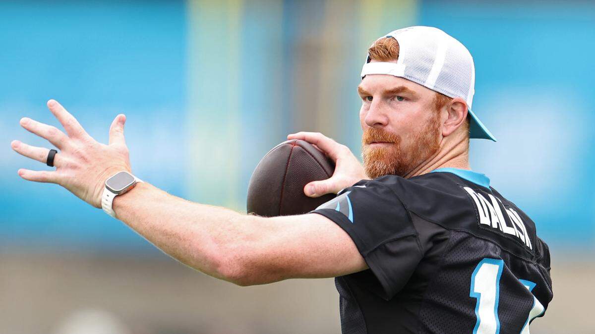 Carolina Panthers quarterback Andy Dalton throws passes during practice on Tuesday, August 6, 2024.
