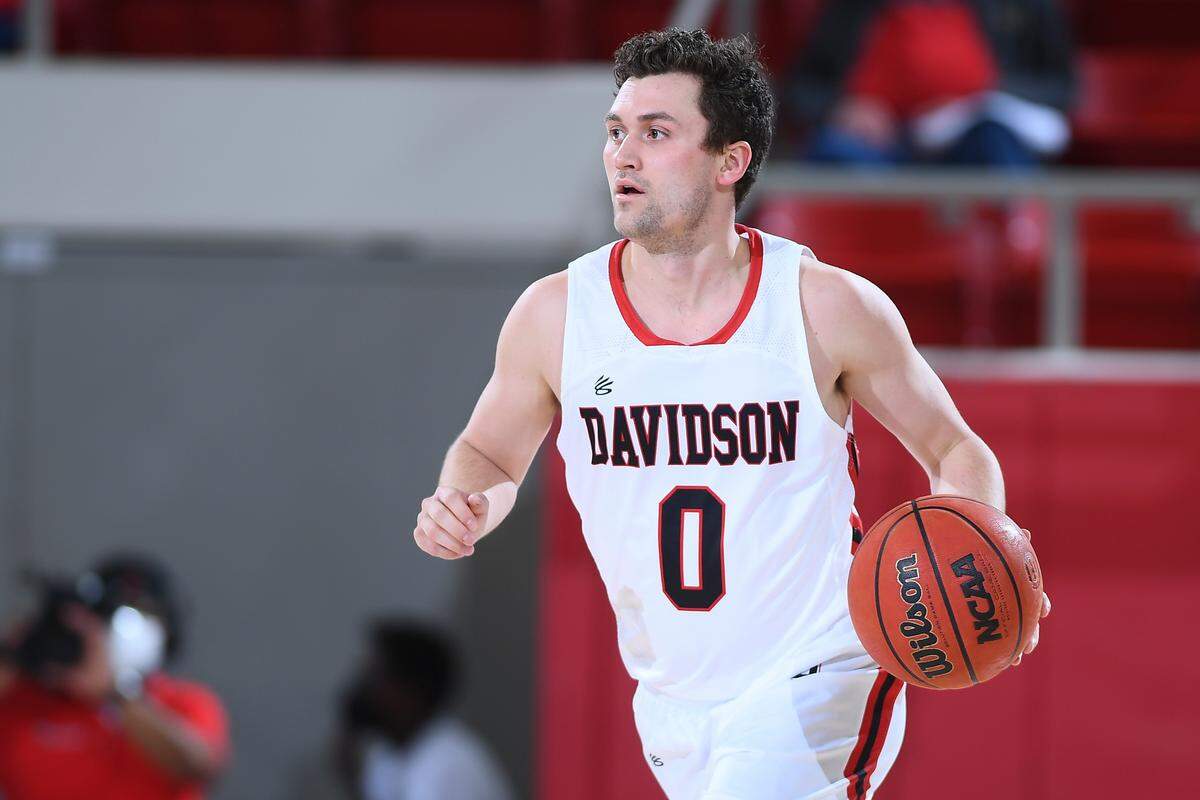 Davidson’s Foster Loyer is a Michigan State transfer who immediately became the team’s starting point guard and a team captain when he joined the squad for the 2021-22 season.