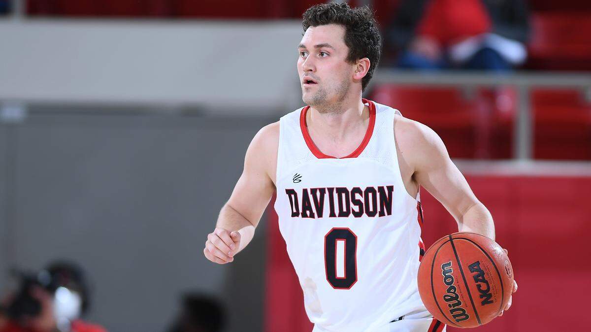 Davidson’s Foster Loyer is a Michigan State transfer who immediately became the team’s starting point guard when he joined the squad for the 2021-22 season.