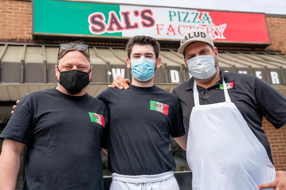 Sal’s Pizza Factory owners Toby Hufhand, Giovanni Colandrea, and Fabio Durazzo at their new location at 2214 Park Rd.