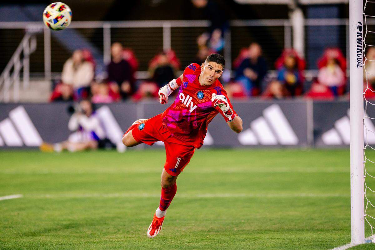 Charlotte FC goalkeeper Kristijan Kahlina makes a save during Charlotte FC’s regular-season finale win over D.C. United, 3-0, on Saturday, Oct. 19, 2024, that locked them into the fifth-seed of the MLS playoffs.
