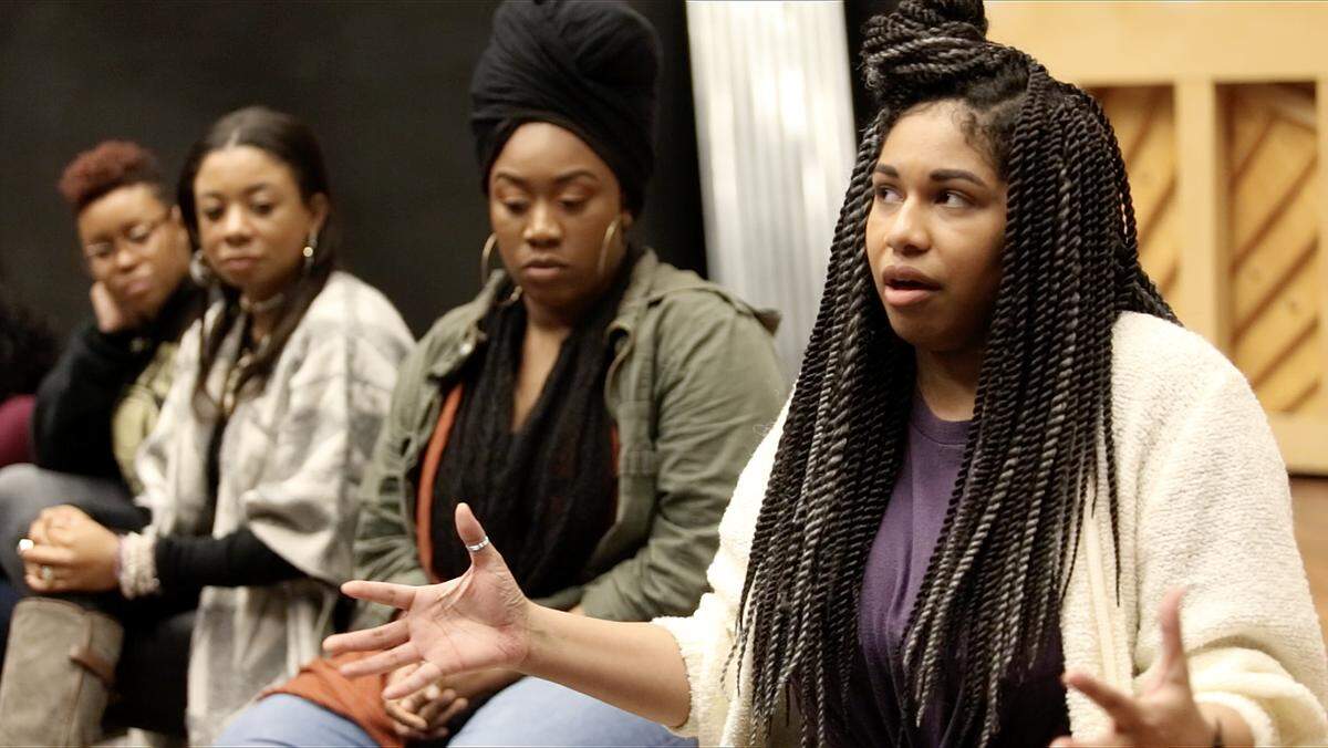 Arlethia Hailstock, far left, listened as director Chanel Blanchett, far right, talks with Actor’s Theatre cast members about “Nina Simone: Four Women” at Actor’s Theatre of Charlotte last year. Hailstock sported a switchblade and spouted insults as Sweet Thing, a man-stealing prostitute last year, in the production.