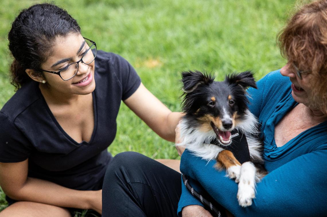 Serena Evans, left, with her mom, Kay Mayes, and her dog, Luca, in Charlotte, on Tuesday, July 20, 2021.