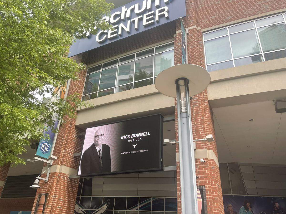 Charlotte Observer beat writer Rick Bonnell is honored outside Spectrum Center, the home of the Charlotte Hornets, on June 2, 2021, a day after he died. Bonnell covered the team for 33 years.