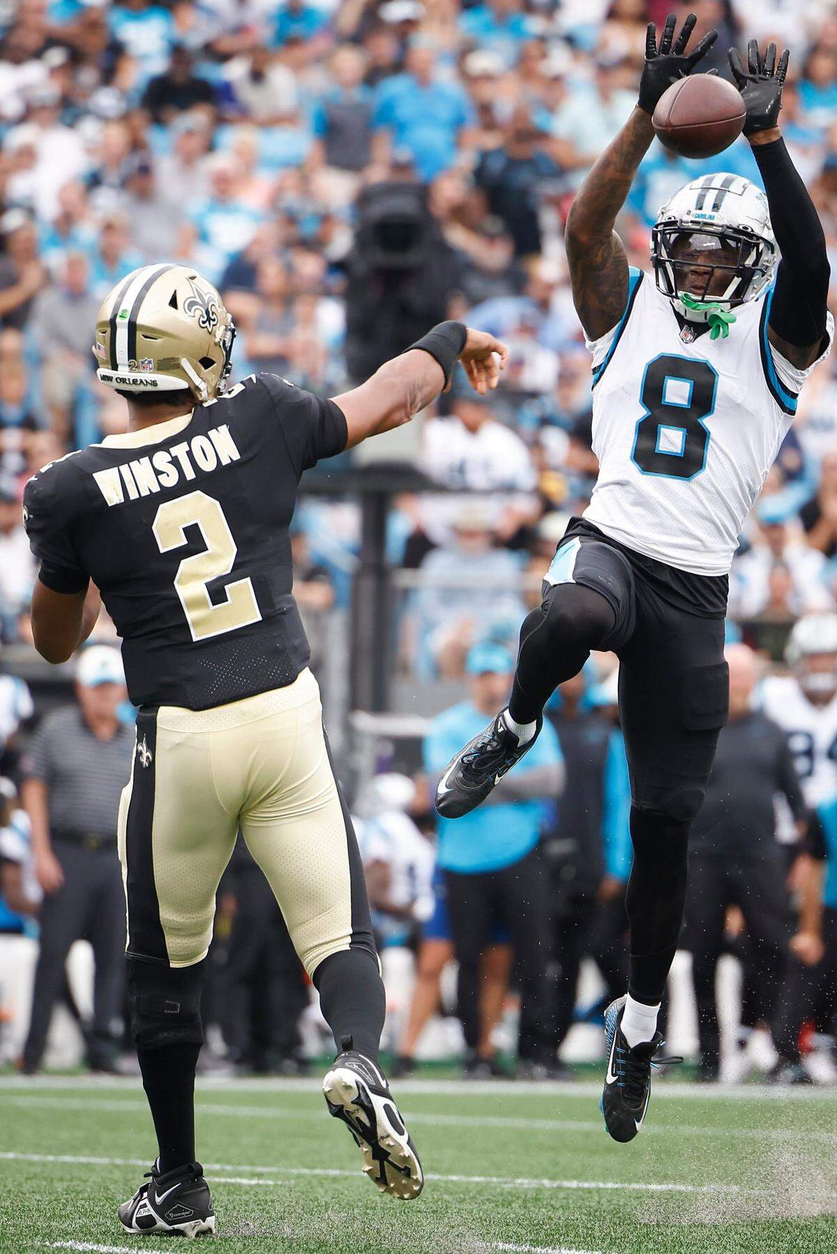 Carolina Panthers cornerback Jaycee Horn (8) blocks a pass by New Orleans Saints quarterback Jameis Winston at Bank of America Stadium in Charlotte on Sunday, Sept. 25, 2022. Horn did not allow a catch, was targeted twice and made the game-sealing interception.