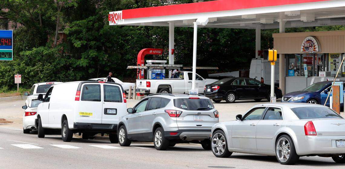 Cars spill onto S. Saunders Street waiting for gas at the Exxon station in Raleigh, N.C., Tuesday afternoon, May 11, 2021.