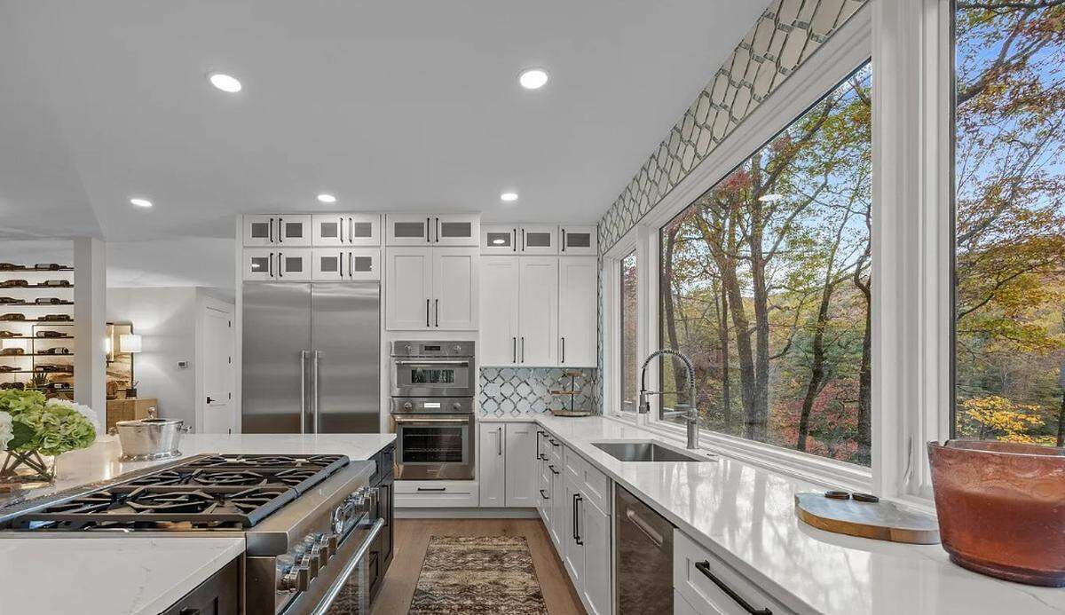 Shown is the kitchen of the home at 95 Cardinal Trace in Lake Toxaway, NC.