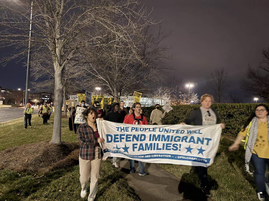 People marched in Ballantyne to protest a company seeking to work with Immigration and Customs Enforcement in Eastern North Carolina.