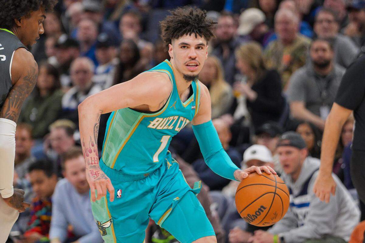Jan 22, 2024; Minneapolis, Minnesota, USA; Charlotte Hornets guard LaMelo Ball (1) dribbles against the Minnesota Timberwolves in the fourth quarter at Target Center. Mandatory Credit: Brad Rempel-USA TODAY Sports