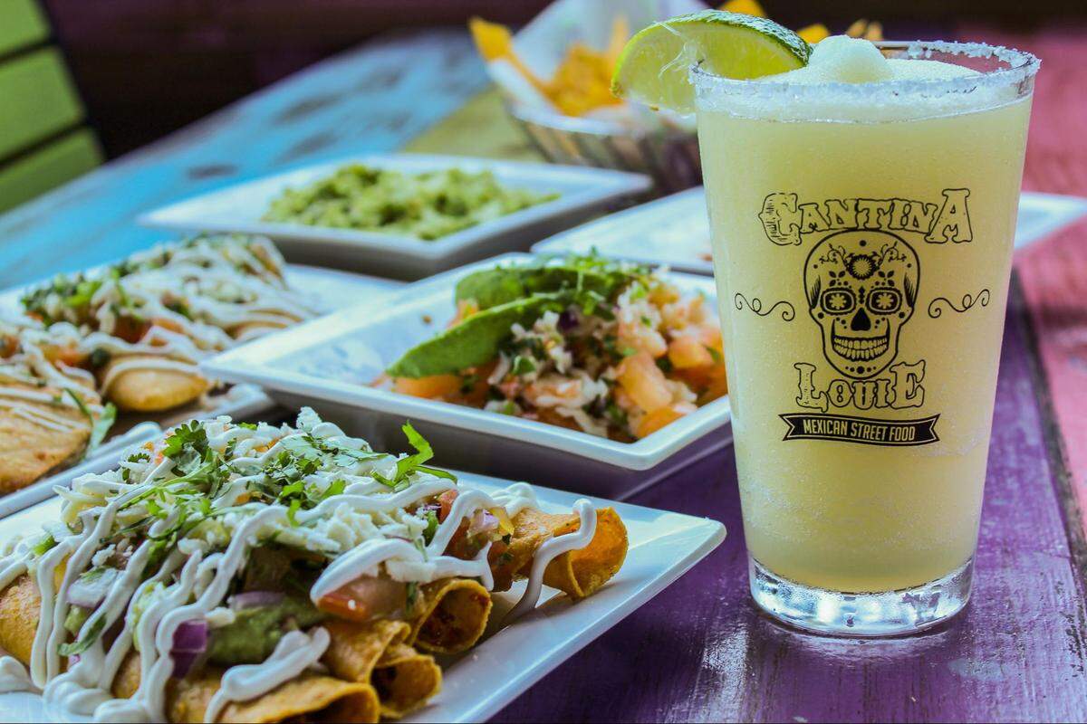 Sip margaritas and enjoy tacos for discounted prices on Taco Tuesdays at Cantina Louie.