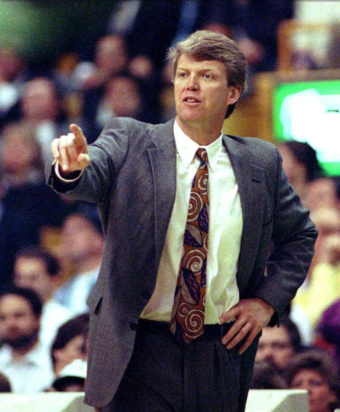 Charlotte Hornets coach Allan Bristow directs play from the sidelines during the first quarter at Boston Garden in 1993.
