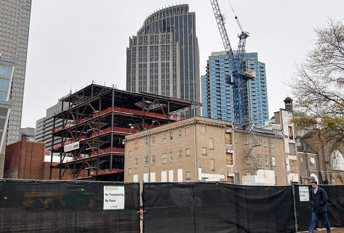 Construction is ongoing of the new Main Library. The facility will be joined by the Spirit Square theaters.
