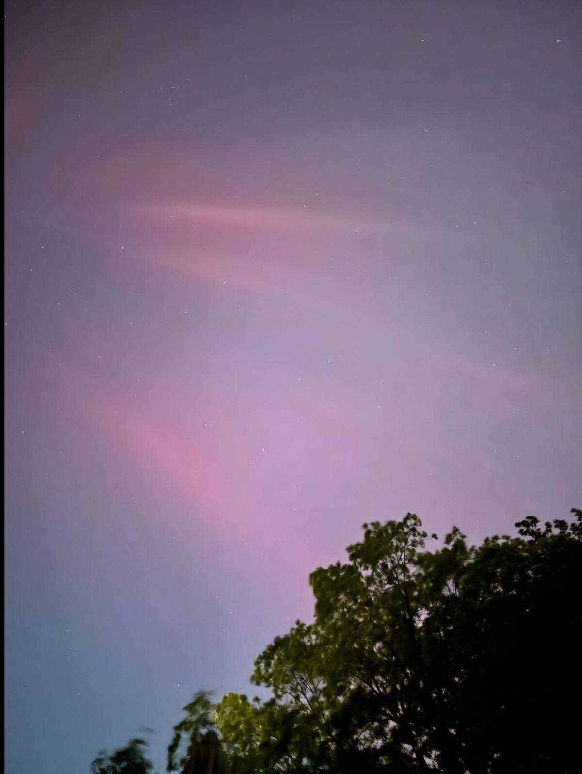 CharlotteFive editor Melissa Oyler captured this image of the northern lights late Friday, May 10, 2024, from the NoDa section of Charlotte.