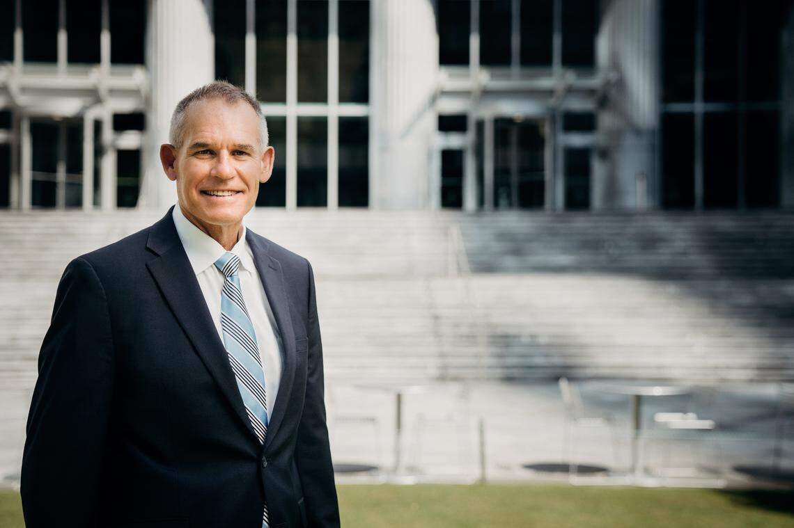 Dean Doug Shackelford of UNC’s Kenan-Flagler Business School in front of Legacy Union in Uptown, where the school’s new MBA program will be housed.