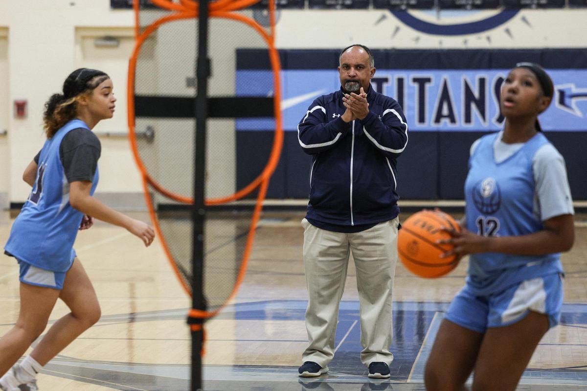 Hopewell head coach Aaron Brown watches the girls varisty basketball team during practice on Thursday, February 8, 2024.