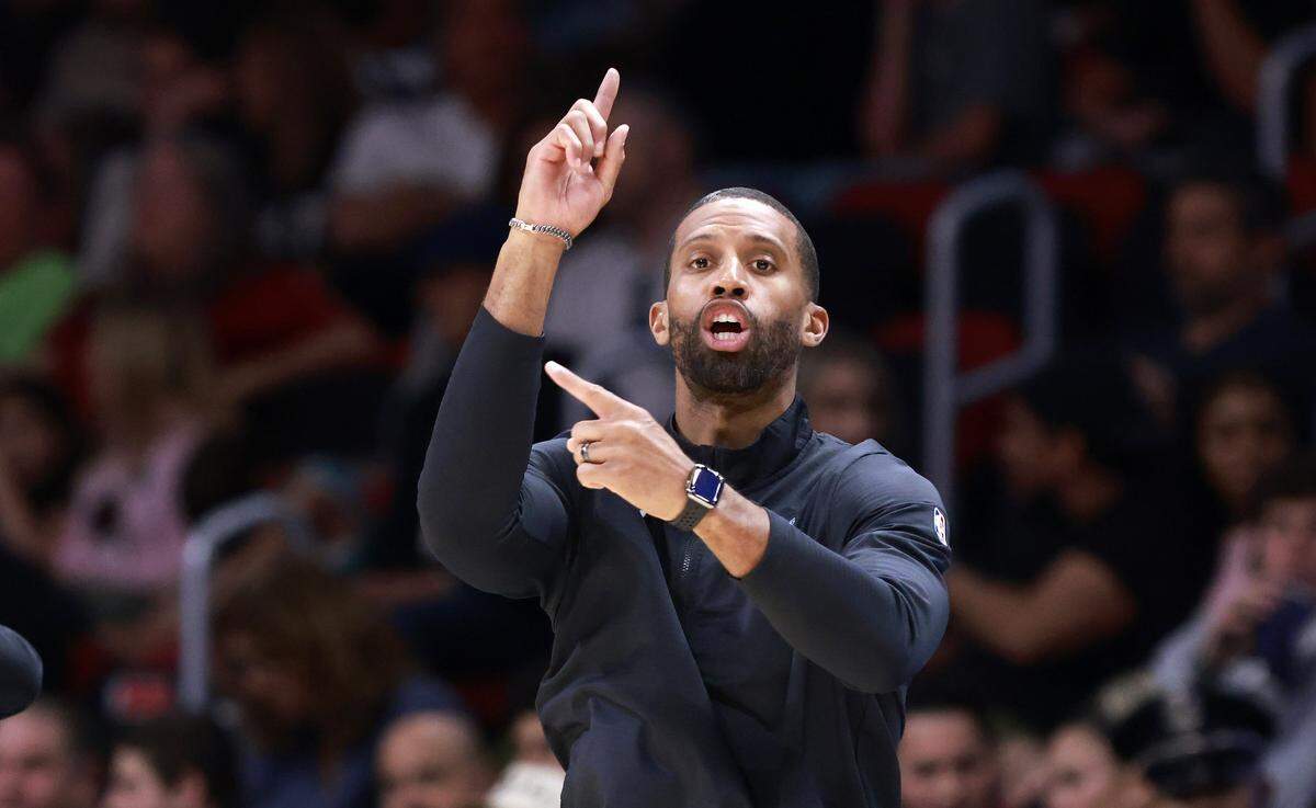 Charlotte Hornets head coach Charles Lee reacts against the Miami Heat during the second half at Kaseya Center.
