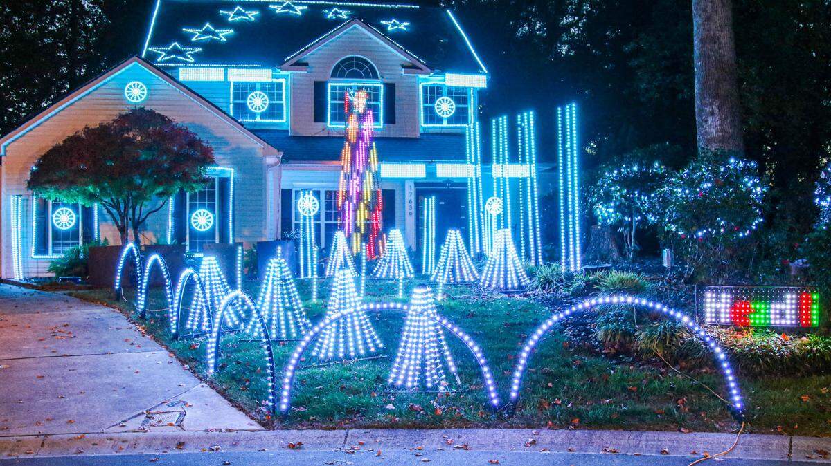 In 2021, Bob Hlastala’s light show house in Huntersville included Christmas music broadcasting on an FM station.