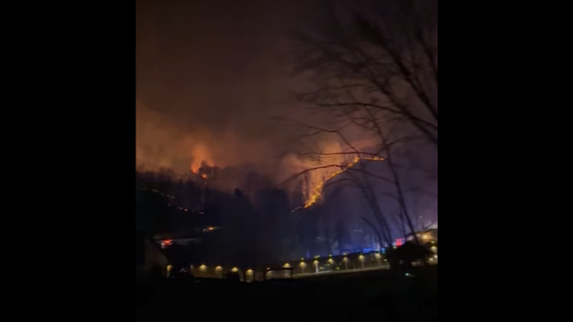 More than a dozen wildfires have erupted in western North Carolina due to gusty winds and dry conditions, officials say. This image is from video posted in the Chandler area by Tabitha McMahon.
