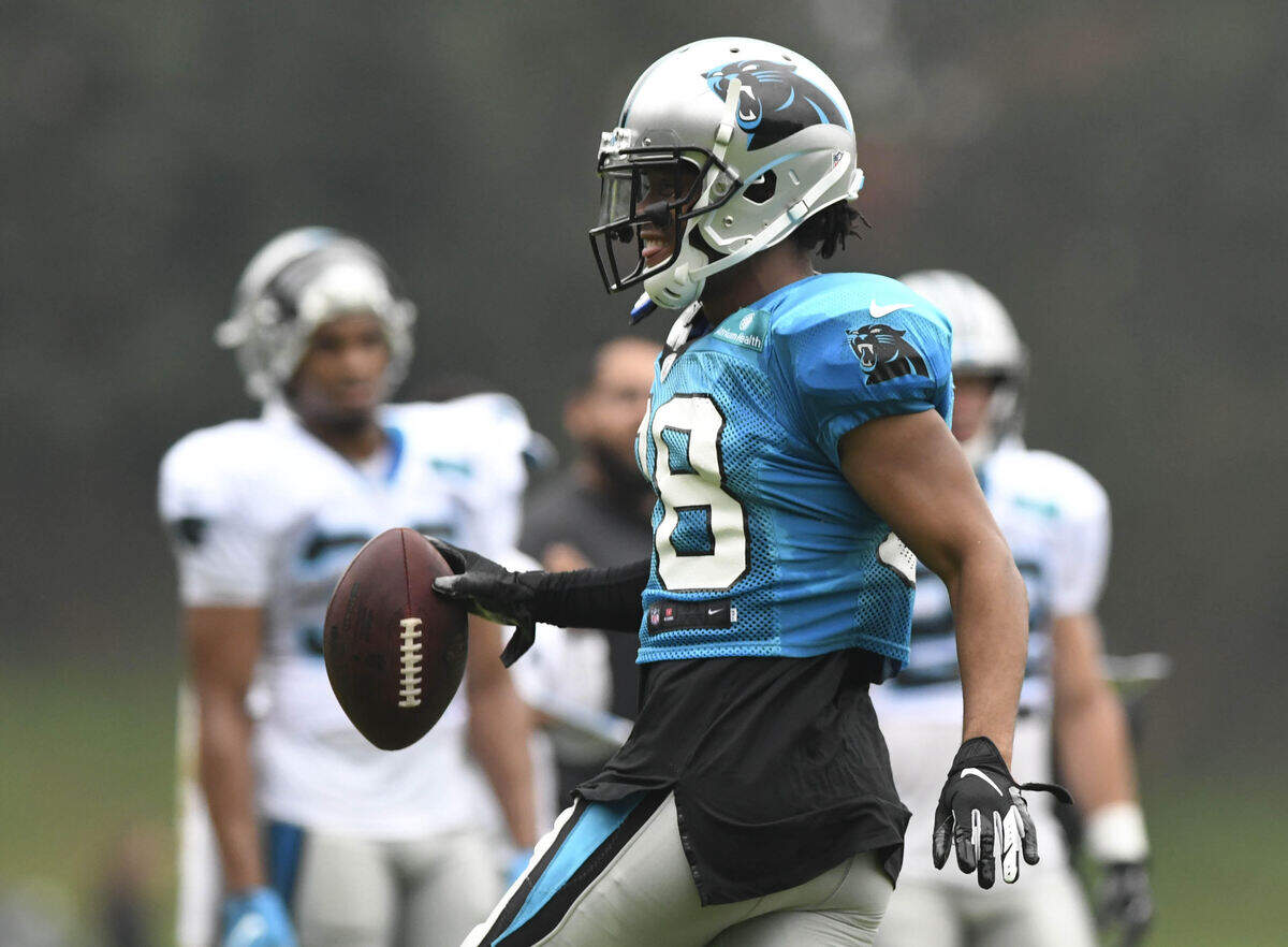 Carolina Panthers cornerback Javien Elliott (38) celebrates an interception of quarterback Cam Newton Monday during training camp. Elliott’s only career NFL interception also came courtesy of Newton during the 2018 season, when Elliott played for Tampa Bay.