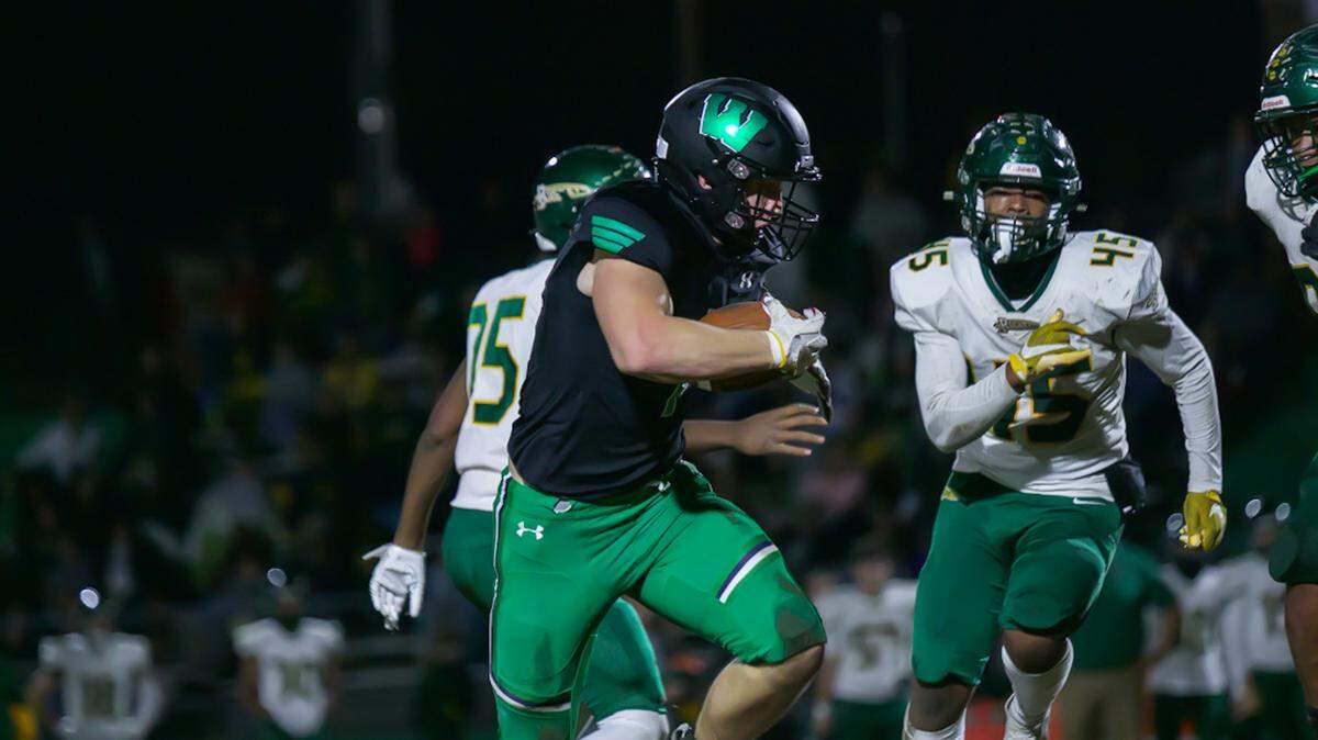 Weddington goes for a first down in the second quarter