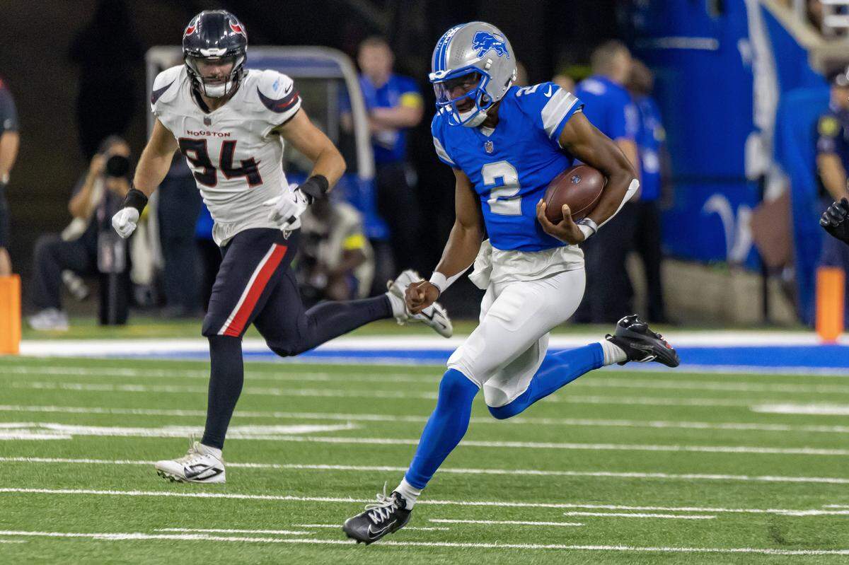 Then-Detroit Lions quarterback Hendon Hooker (2) runs with the ball against the Houston Texans during the second half at Ford Field on Aug. 3, 2025.