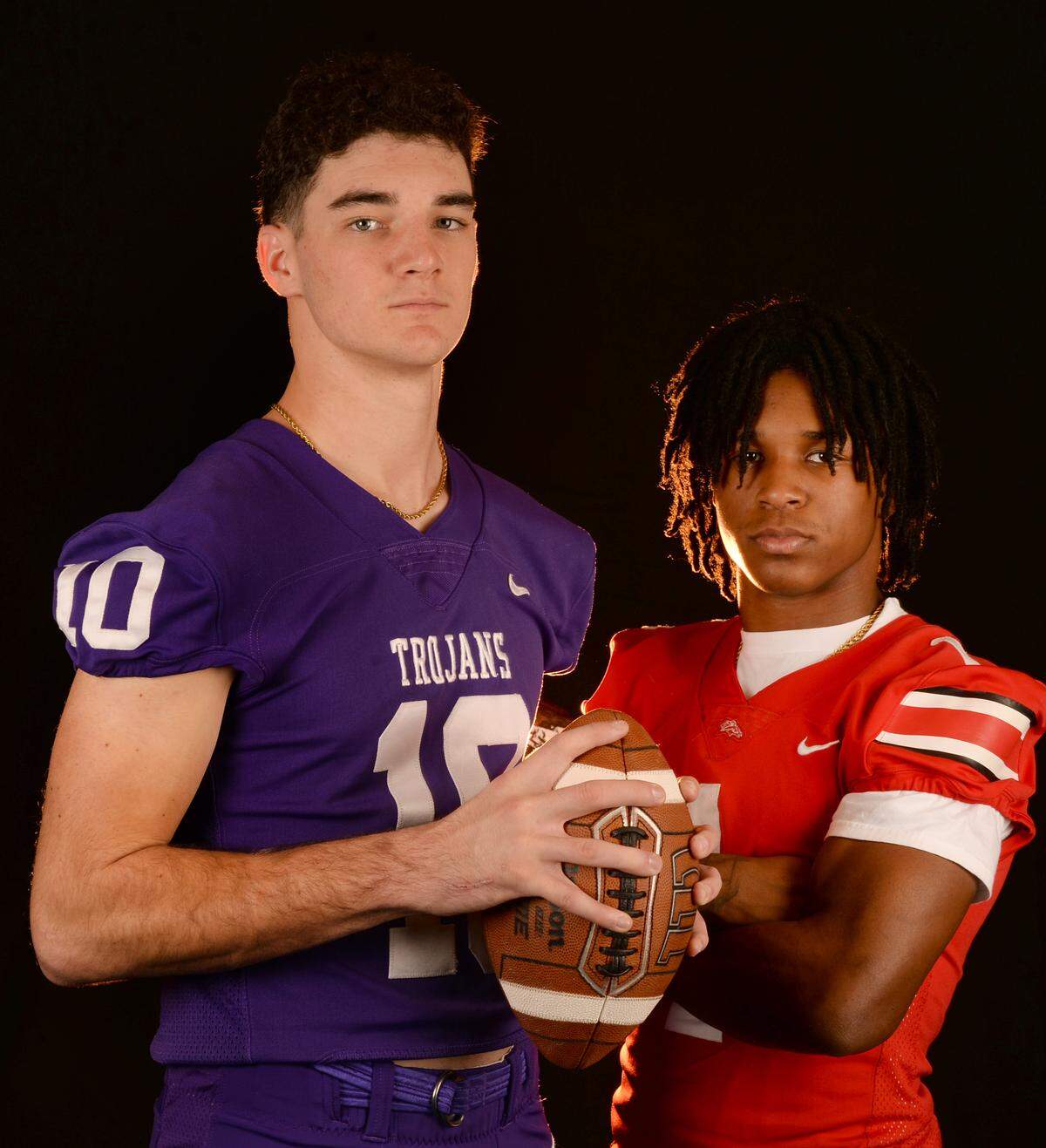 Northwestern Trojans quarterback Finley Polk, left and South Pointe running back Mason Pickett-Hicks, right, on Wednesday, December 11, 2024.