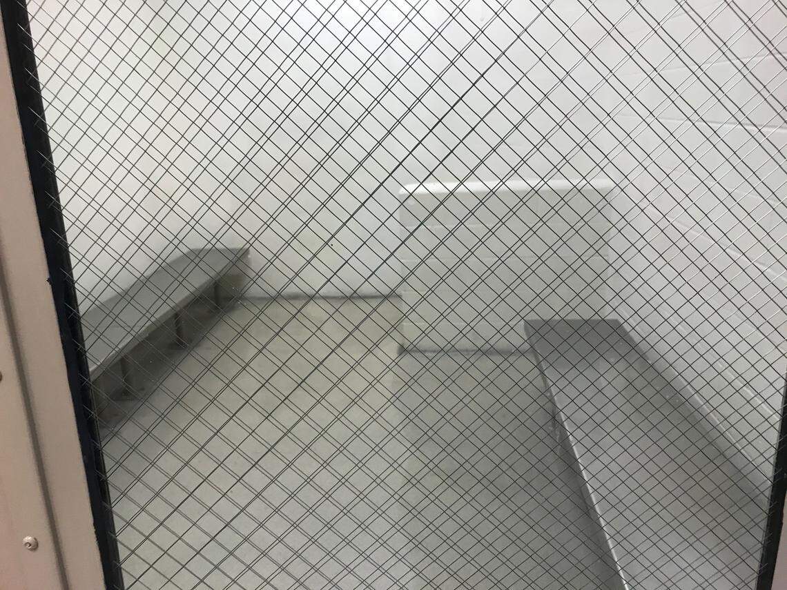 Holding cells like this one at Meckenburg Jail Central - which are about 10 feet by 15 feet in size - held up to 9 detainees, according to people who were detained at the jail earlier this year. That, they say, made it impossible to practice social distancing.