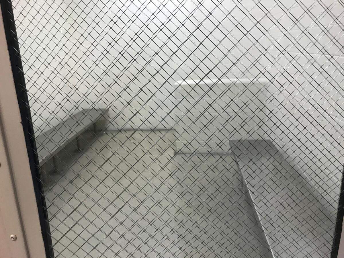 Holding cells like this one at Meckenburg Jail Central - which are about 10 feet by 15 feet in size - held up to 9 detainees, according to people who were detained at the jail earlier this year. That, they say, made it impossible to practice social distancing.