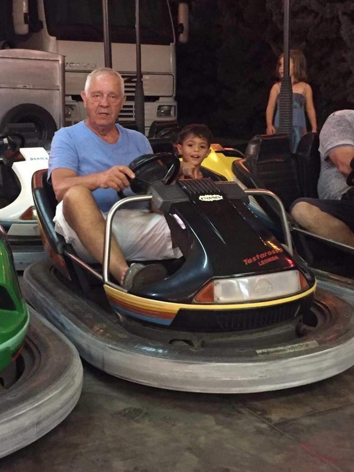 Panos Photopoulos enjoys bumper cars with his family in this family photo.
