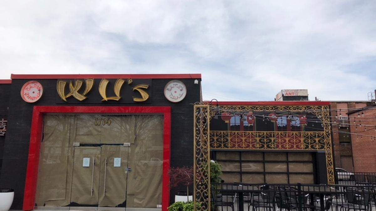 The windows were papered over at Wu's Cajun Seafood in Charlotte on Friday.