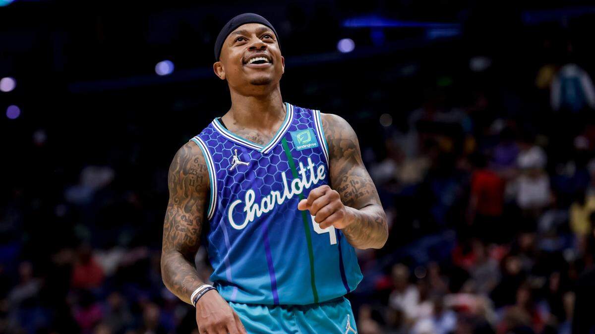 Charlotte Hornets guard Isaiah Thomas (4) reacts after scoring in the fourth quarter of an NBA basketball game against the New Orleans Pelicans in New Orleans, Friday, March 11, 2022. (AP Photo/Derick Hingle)