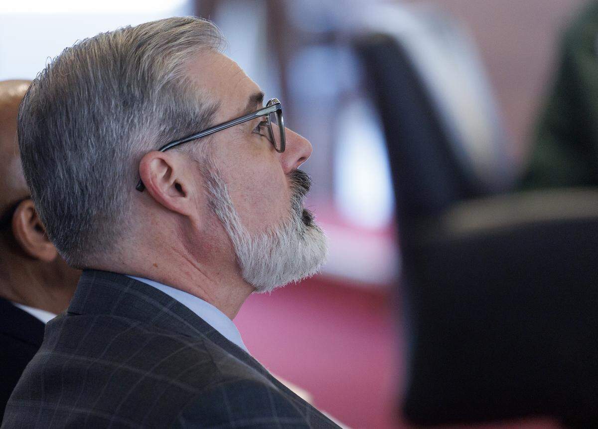 Charlotte Area Transit System Interim CEO Brent Cagle listens as Mecklenburg County Sheriff Garry McFadden testifies before the House Select Committee on Oversight and Reform on Feb. 9 in Raleigh.