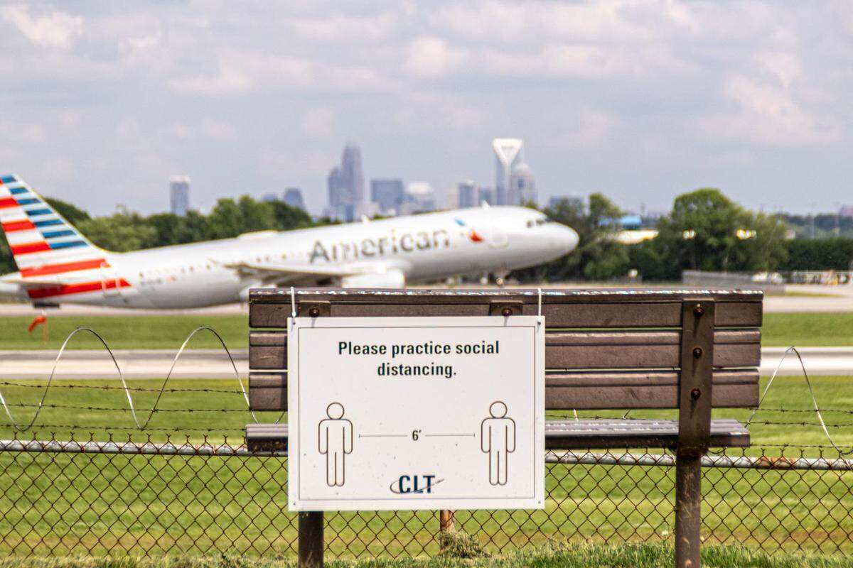 A plane lands at Charlotte Douglas International Airport on July 22, 2020, during the COVID-19 pandemic.
