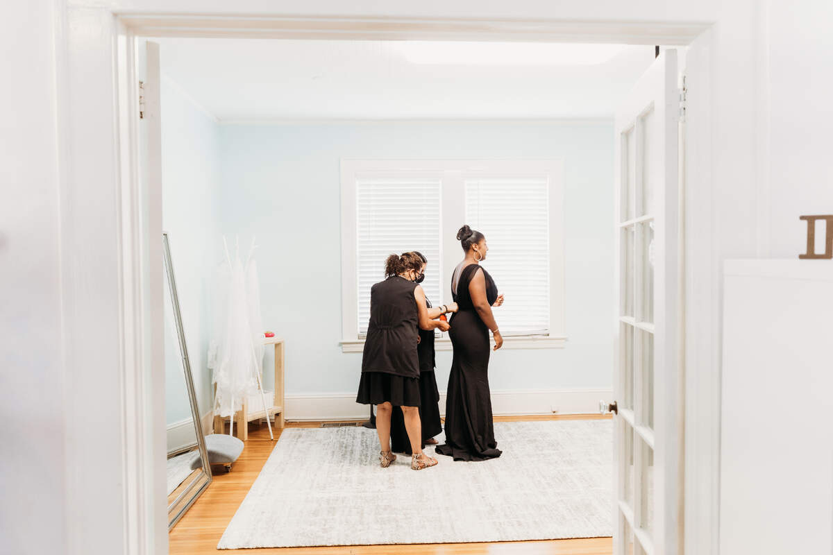 The John Emily Studio team works with a client.