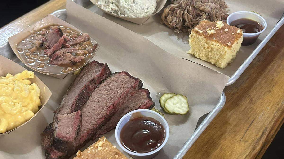 Plated meals are served with a piece of cornbread at Ben’s Backdraft Barbecue.