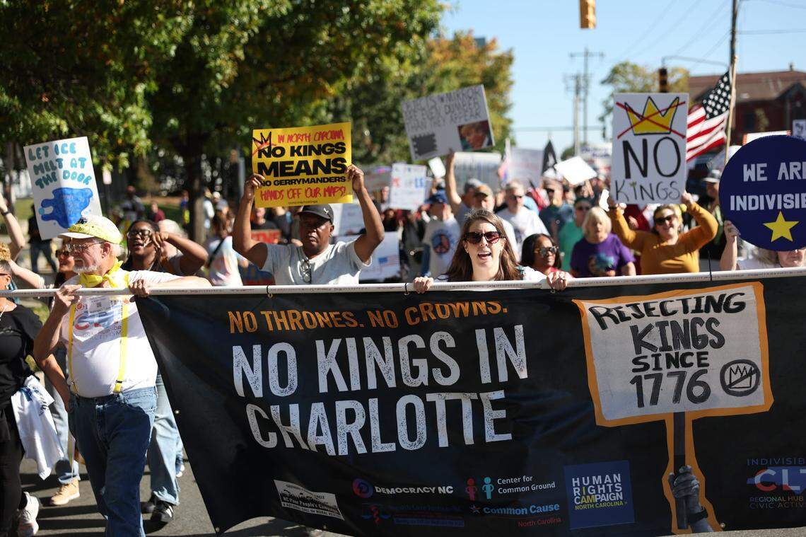 The ‘No Kings’ march makes its way through uptown Charlotte on Saturday, Oct. 18. The protest is part of a national movement to rally against policies enacted by President Donald Trump.
