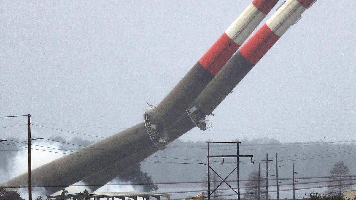 The 300-foot tall stacks fall at the Grainger Generation Station in Conway on Sunday, Feb. 7, 2016. Santee Cooper closed the plant at the end of 2012 after 50 years of coal-fired power generating. The company still operates the Winyah coal plant in Georgetown County, as well as a coal plant in Berkeley County.