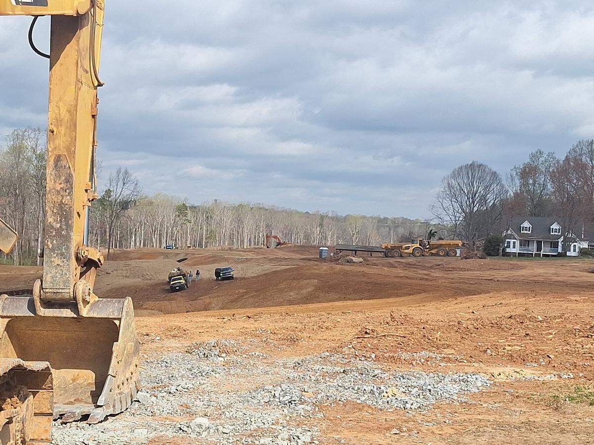 Crews continued to grade land on Thursday, March 20, 2025, for the planned Preserve at Mayes Meadow community on Mayes Road in Cornelius.